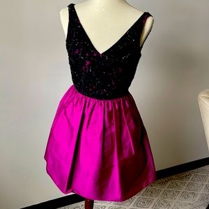 Adorable cocktail dress with pockets!
